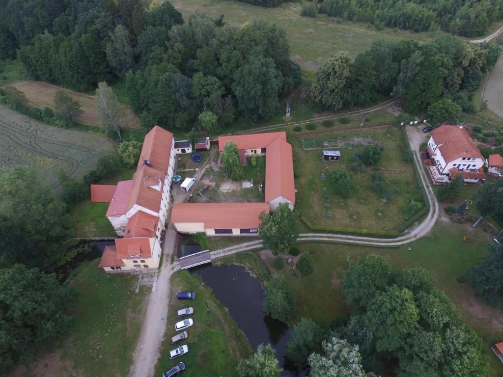 an aerial view of a house with a bridge at Fähnrichův mlýn in Stráž nad Nežárkou