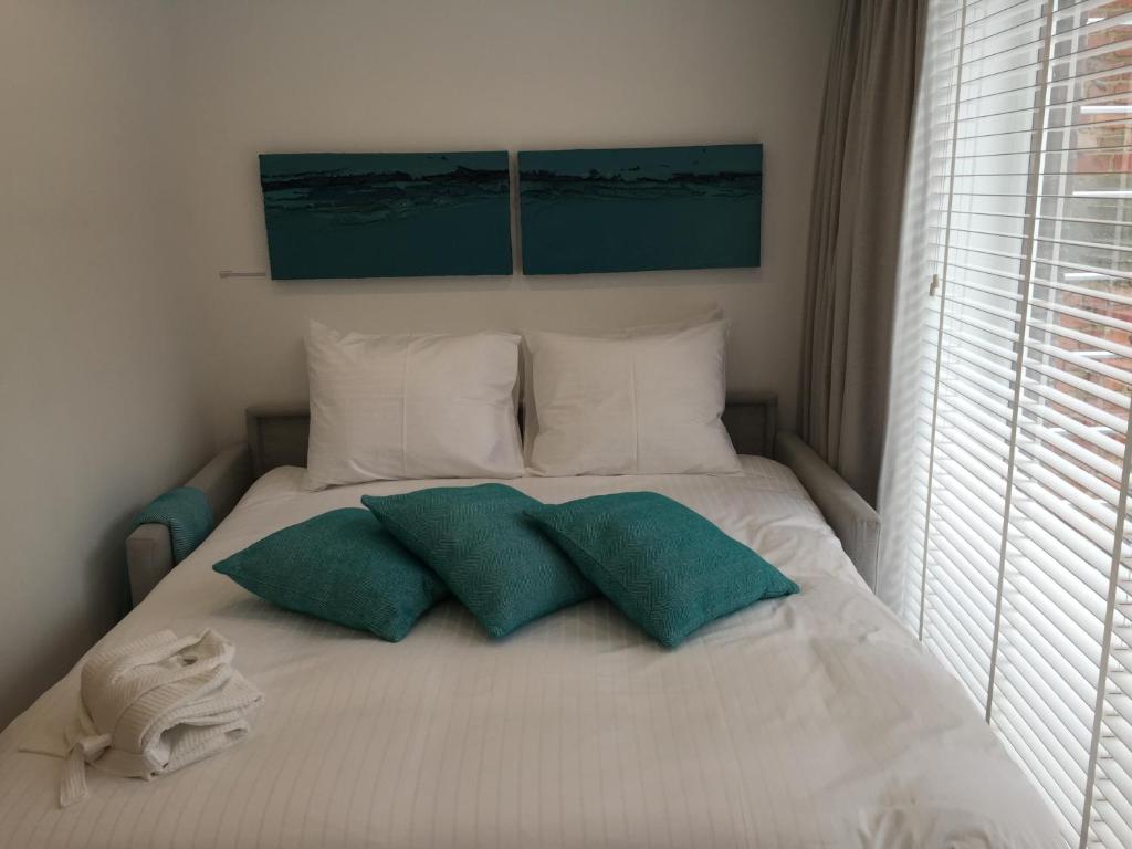 Postel nebo postele na pokoji v ubytování Antwerp Town House Accommodations