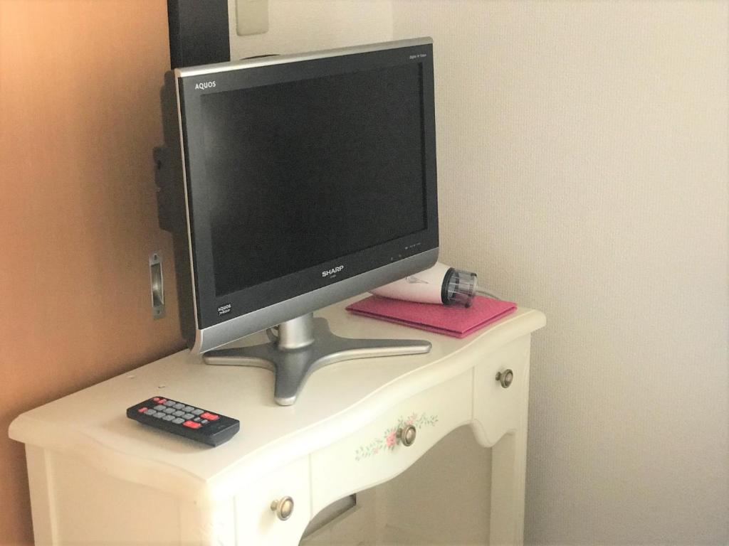 ココステイ フェリーチェにあるテレビまたはエンターテインメントセンター