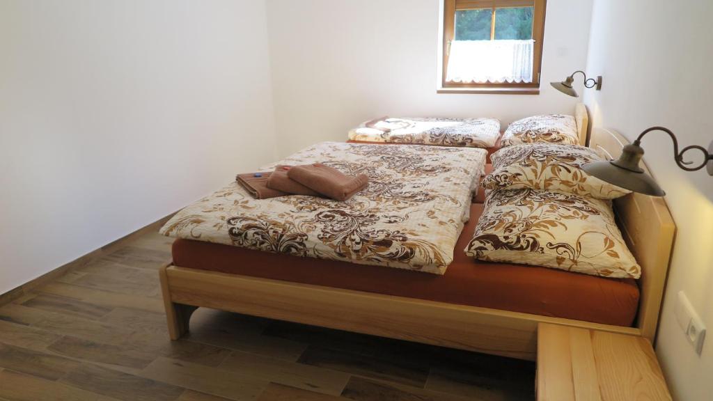 Postel nebo postele na pokoji v ubytování Club Rezidence Pod Lučí