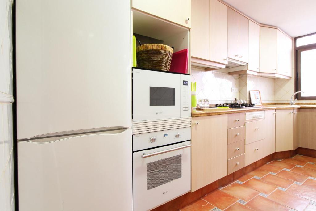 Kuchyňa alebo kuchynka v ubytovaní Global Properties, El Coquetón - Bonito y tranquilo apartamento en Canet playa