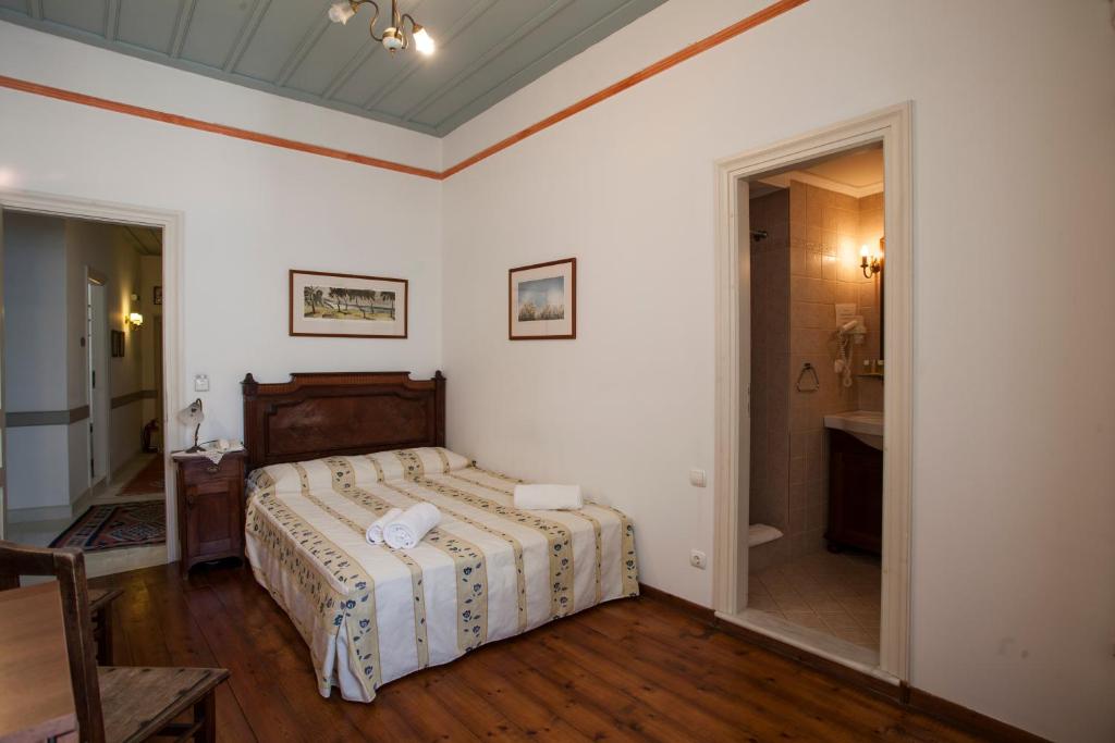 Postel nebo postele na pokoji v ubytování Nostos Guesthouse