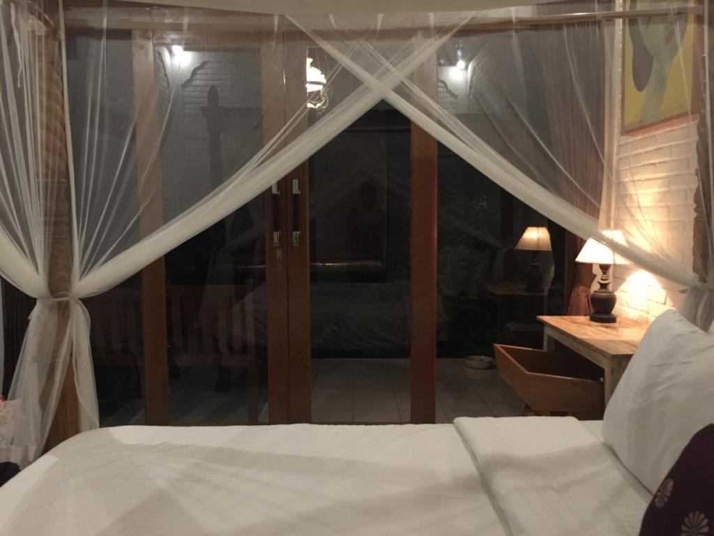 Postel nebo postele na pokoji v ubytování Depong House