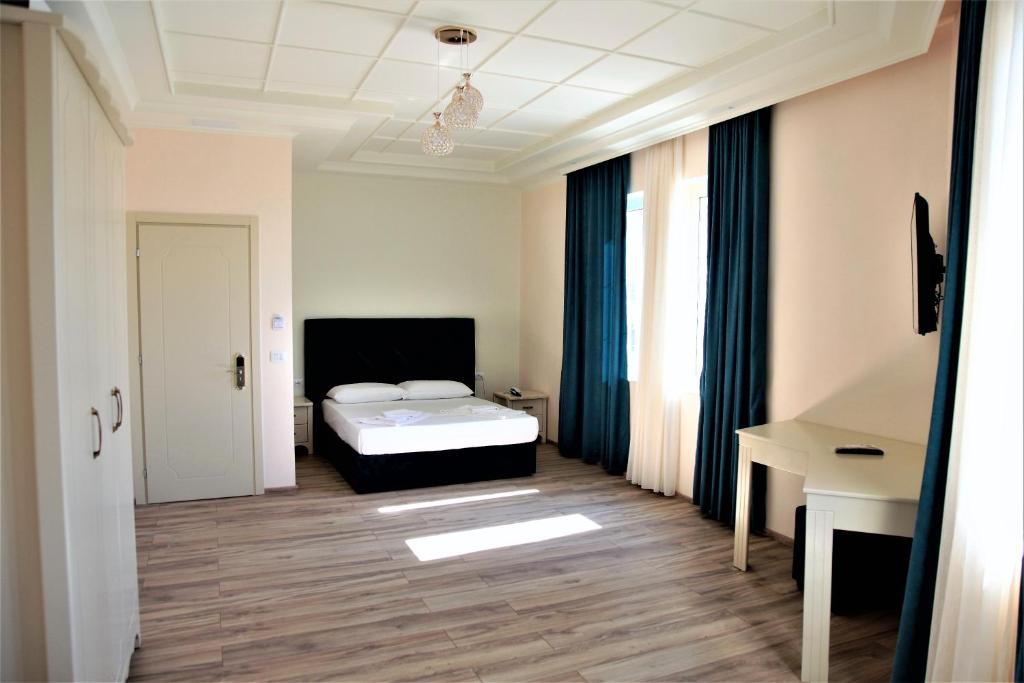 Postel nebo postele na pokoji v ubytování Hotel Veliera