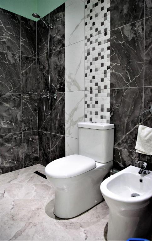 Koupelna v ubytování Hotel Veliera