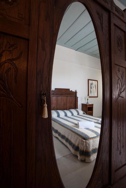 Postel nebo postele na pokoji v ubytování Nostos Guesthouse
