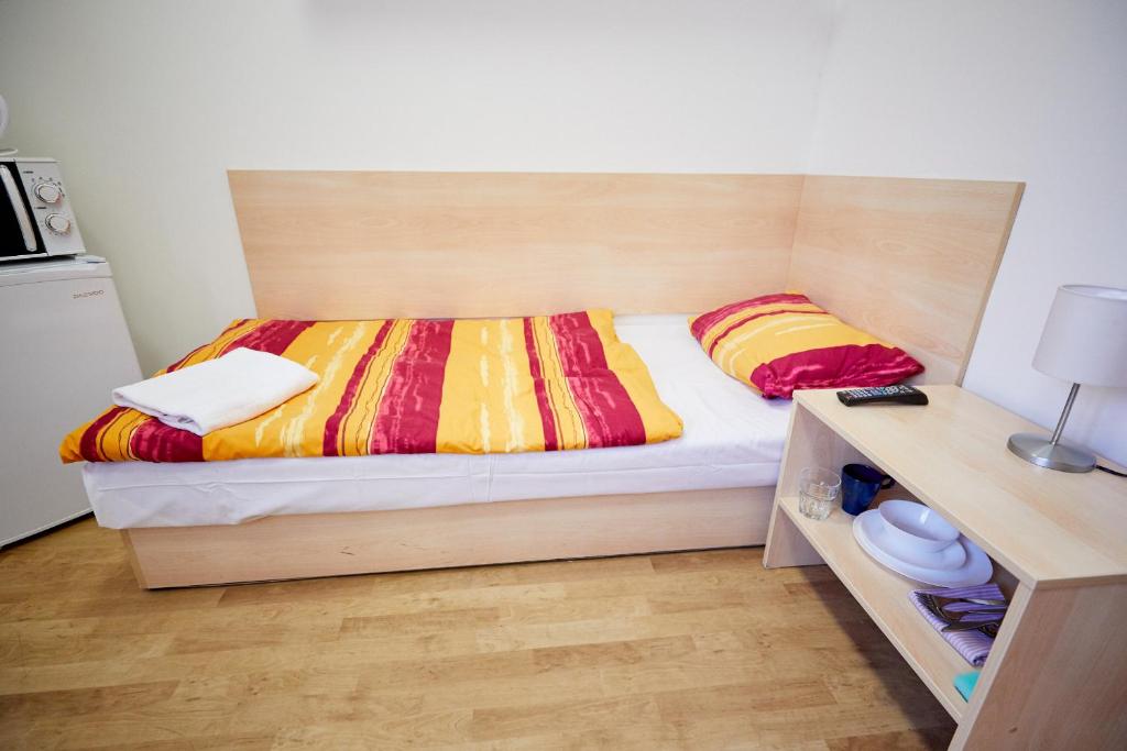 Postel nebo postele na pokoji v ubytování University Hotel