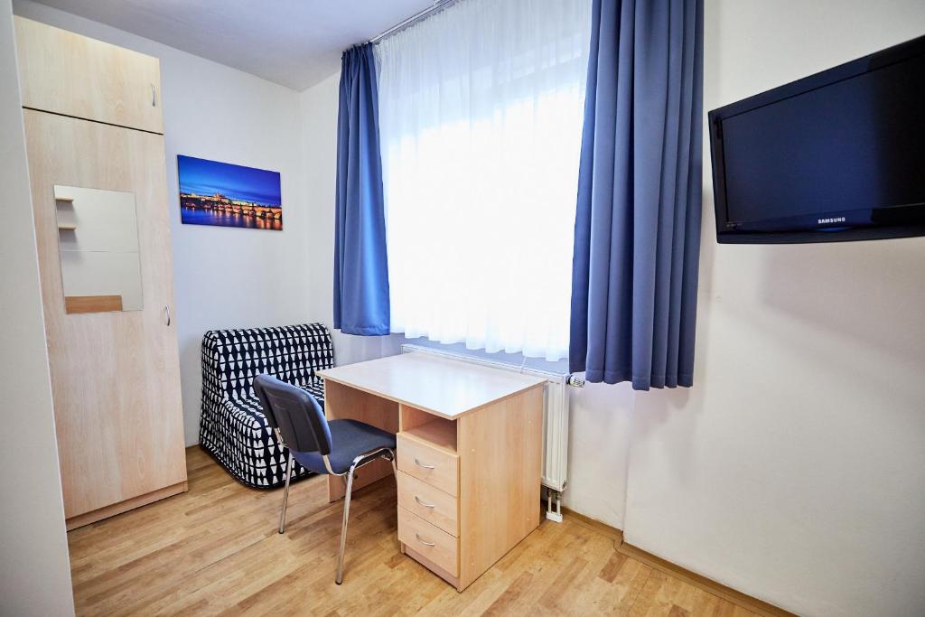 TV a/nebo společenská místnost v ubytování University Hotel
