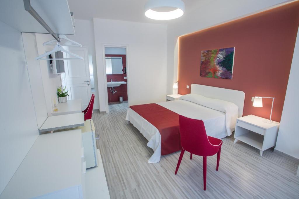 Postel nebo postele na pokoji v ubytování B&B al Centro