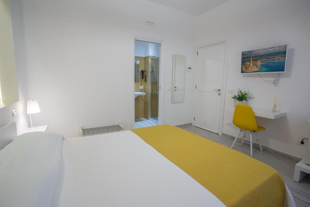 Postel nebo postele na pokoji v ubytování B&B al Centro