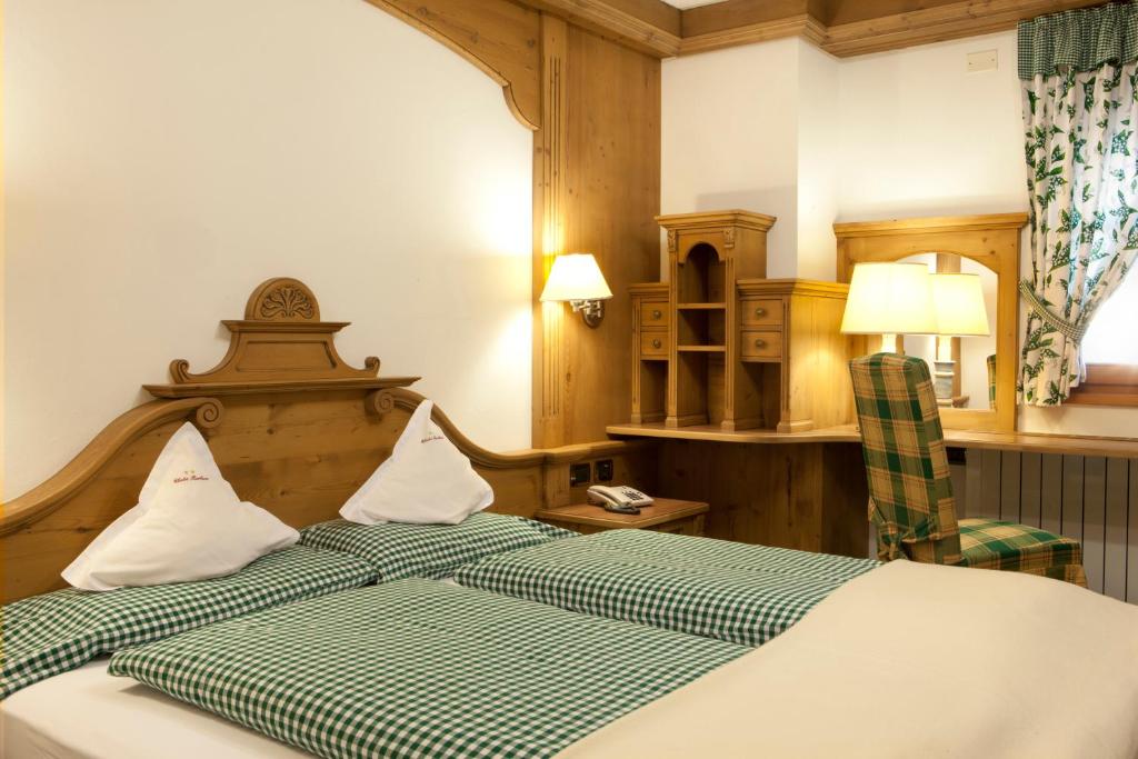 Postel nebo postele na pokoji v ubytování Chalet Barbara