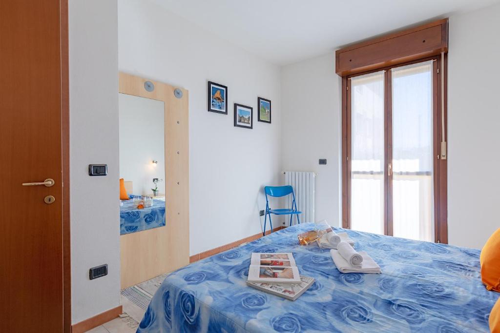 Posteľ alebo postele v izbe v ubytovaní La Mimosa B03 Apartment by Wonderful Italy