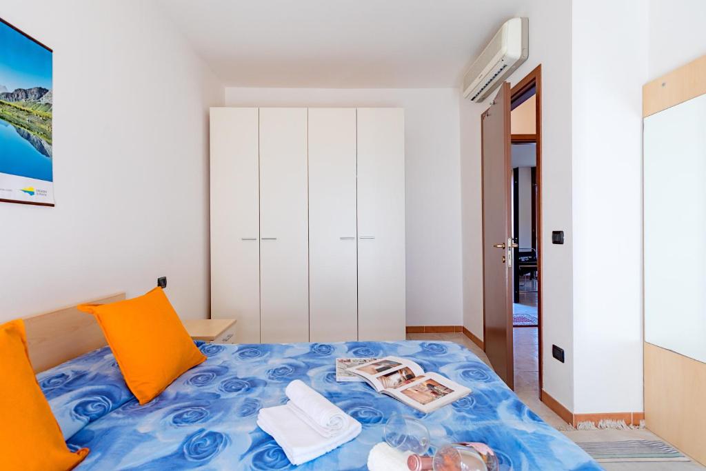 Posteľ alebo postele v izbe v ubytovaní La Mimosa B03 Apartment by Wonderful Italy