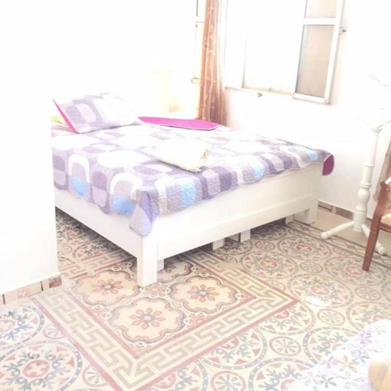 Postel nebo postele na pokoji v ubytování Akko Gate Hostel