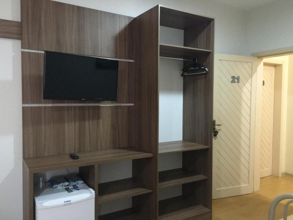 TV a/nebo společenská místnost v ubytování Elite Palace Hotel