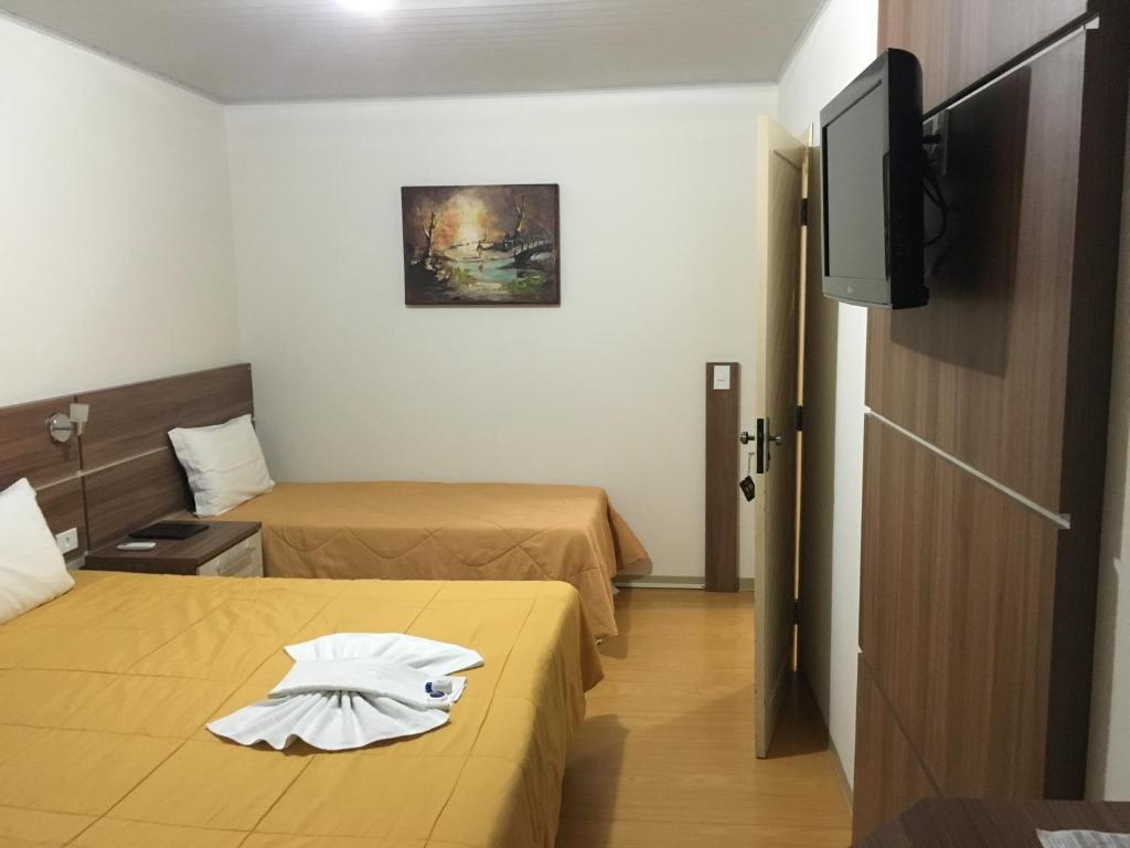 TV a/nebo společenská místnost v ubytování Elite Palace Hotel