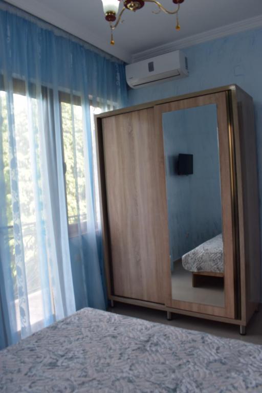 Postel nebo postele na pokoji v ubytování Guest house BAGRATIONI