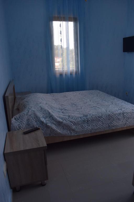 Postel nebo postele na pokoji v ubytování Guest house BAGRATIONI