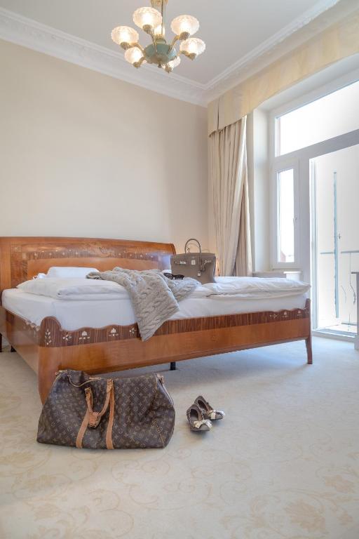Postel nebo postele na pokoji v ubytování Hotel Miramar