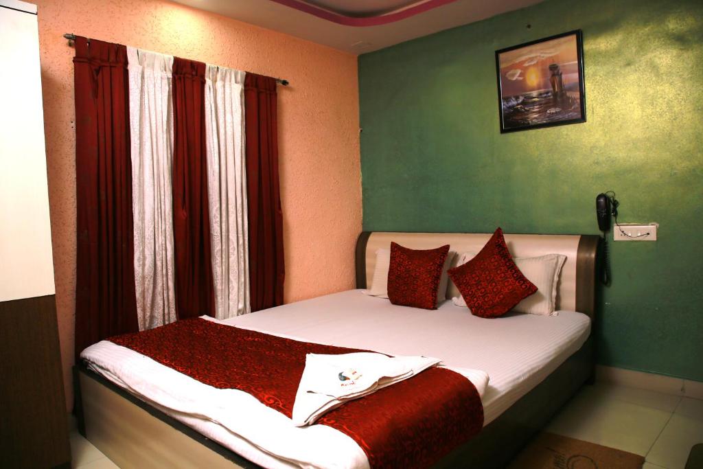 Postel nebo postele na pokoji v ubytování Babul Hotel