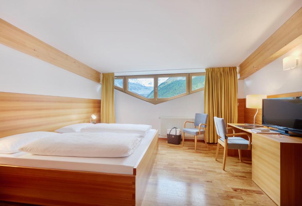 Postel nebo postele na pokoji v ubytování Hotel Marlet