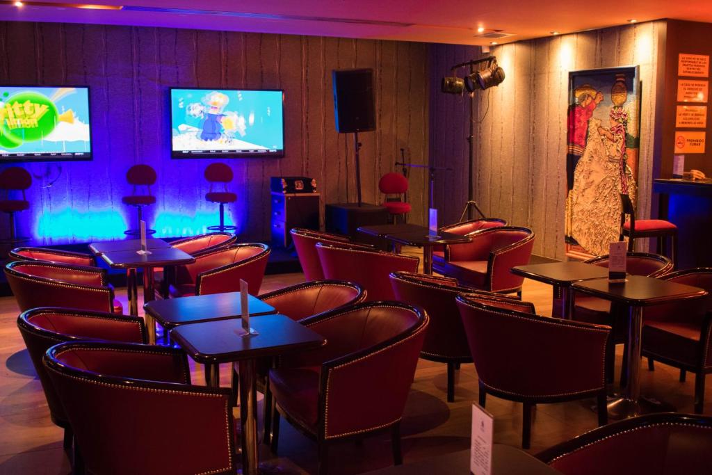 TV a/nebo společenská místnost v ubytování Hotel Guarani Asuncion