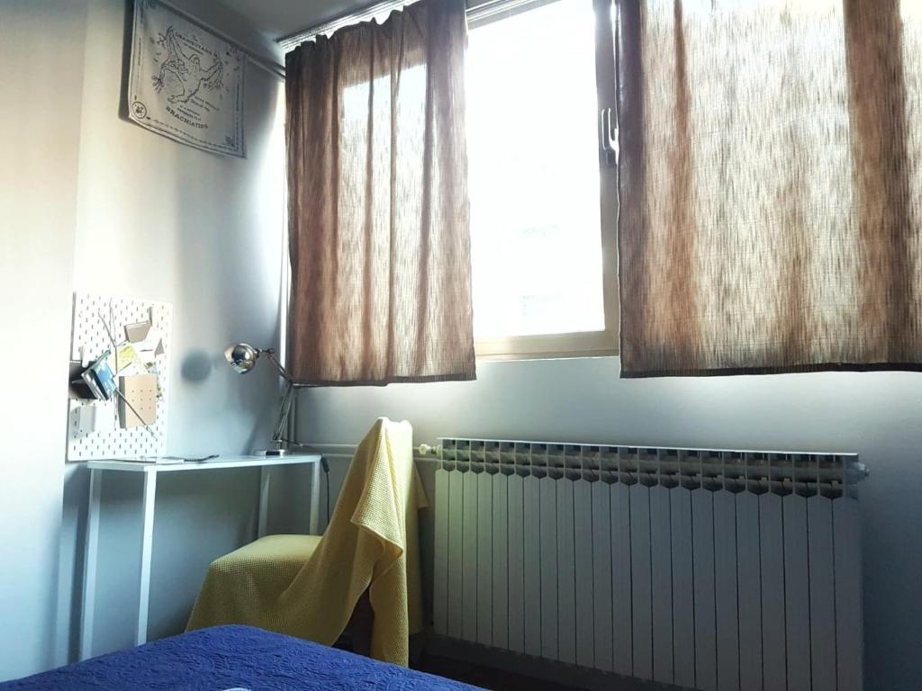 Postel nebo postele na pokoji v ubytování Blue Dreams Apartment