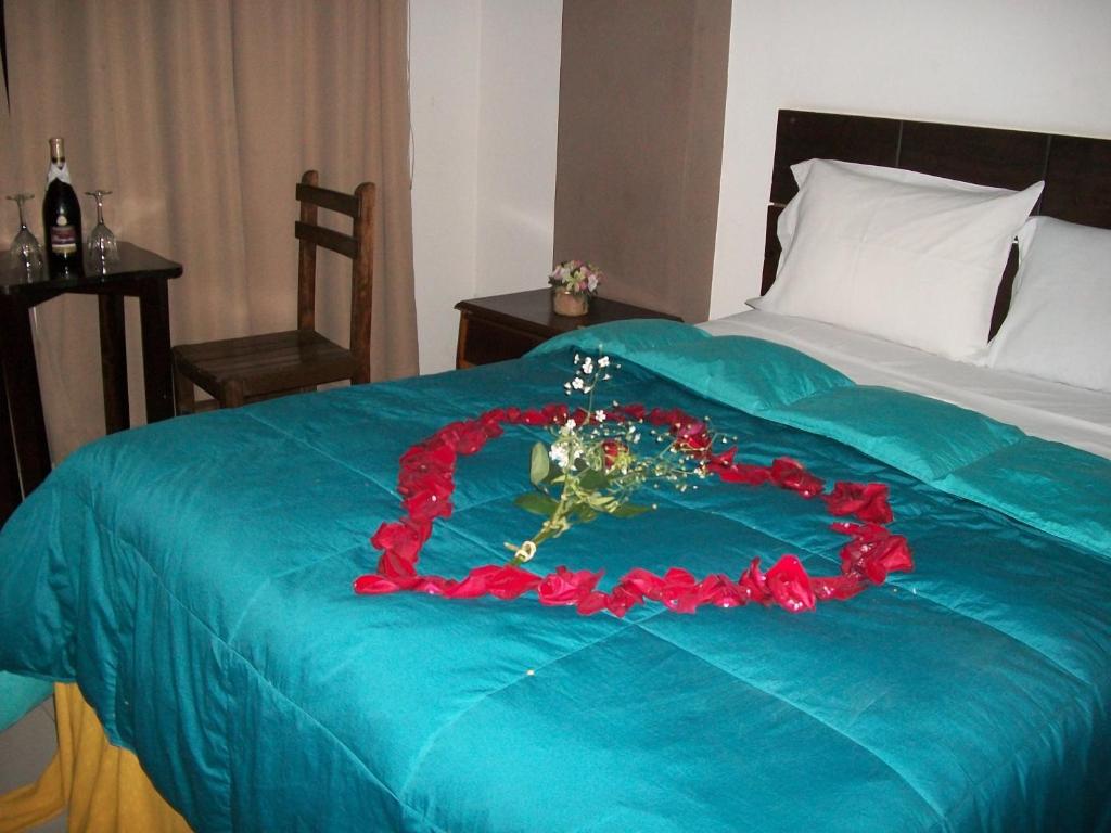 Postel nebo postele na pokoji v ubytování Suites El Parque