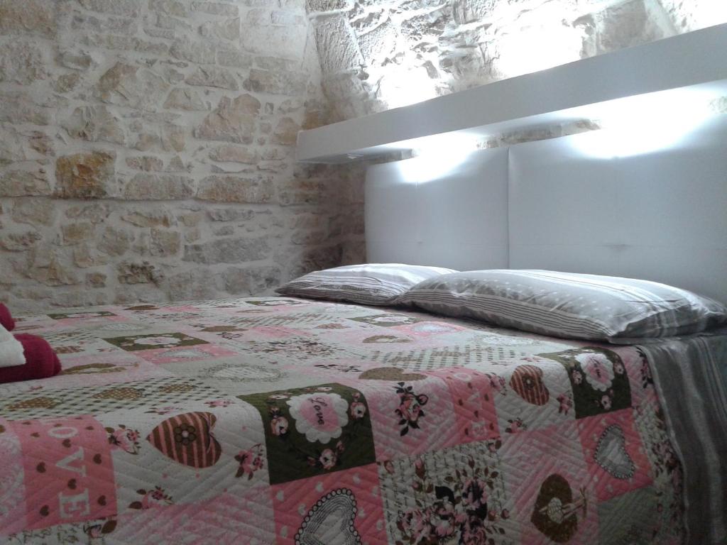 Łóżko lub łóżka w pokoju w obiekcie Lilla B&B