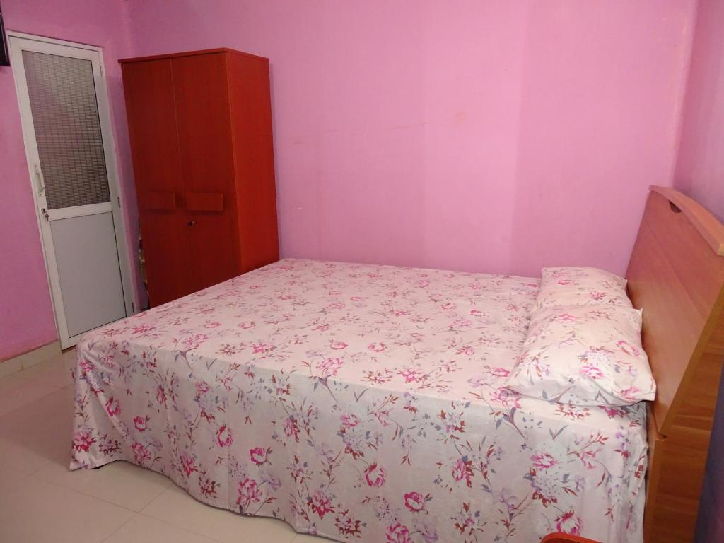 Katil atau katil-katil dalam bilik di Manjula Luxury Apartment