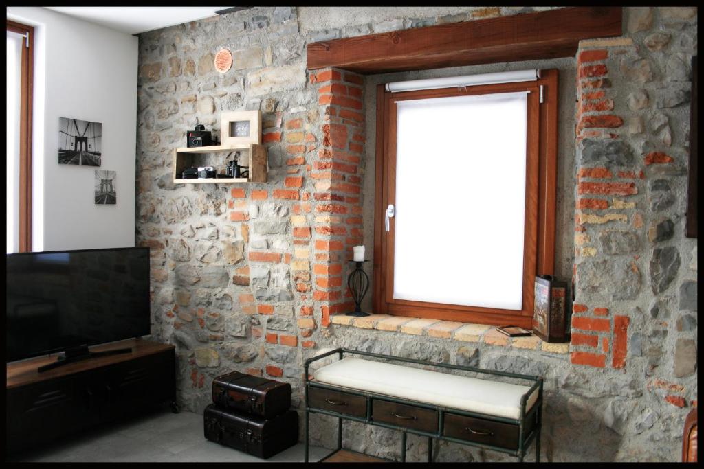 A television and/or entertainment centre at Casa Vacanze Borc dai Cucs