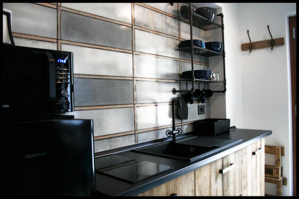 A kitchen or kitchenette at Casa Vacanze Borc dai Cucs