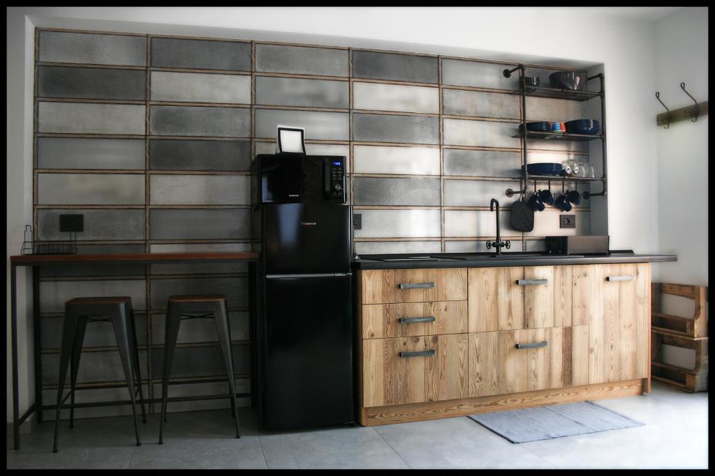 A kitchen or kitchenette at Casa Vacanze Borc dai Cucs