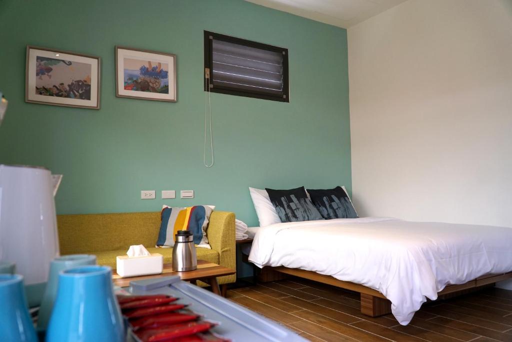 Voodi või voodid majutusasutuse Bo Bo Mi B&B toas