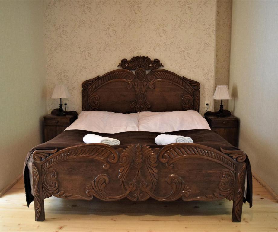 Postel nebo postele na pokoji v ubytování ELISO'S GUESTHOUSE