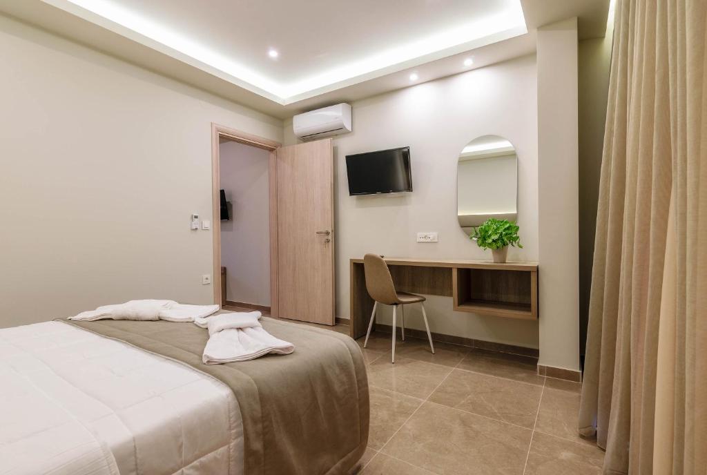 Postel nebo postele na pokoji v ubytování Remezzo Studios & Apartments