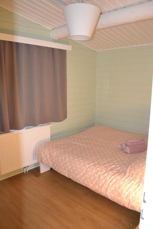 Postel nebo postele na pokoji v ubytování Le Numéro 12 - Chalet à Francorchamps