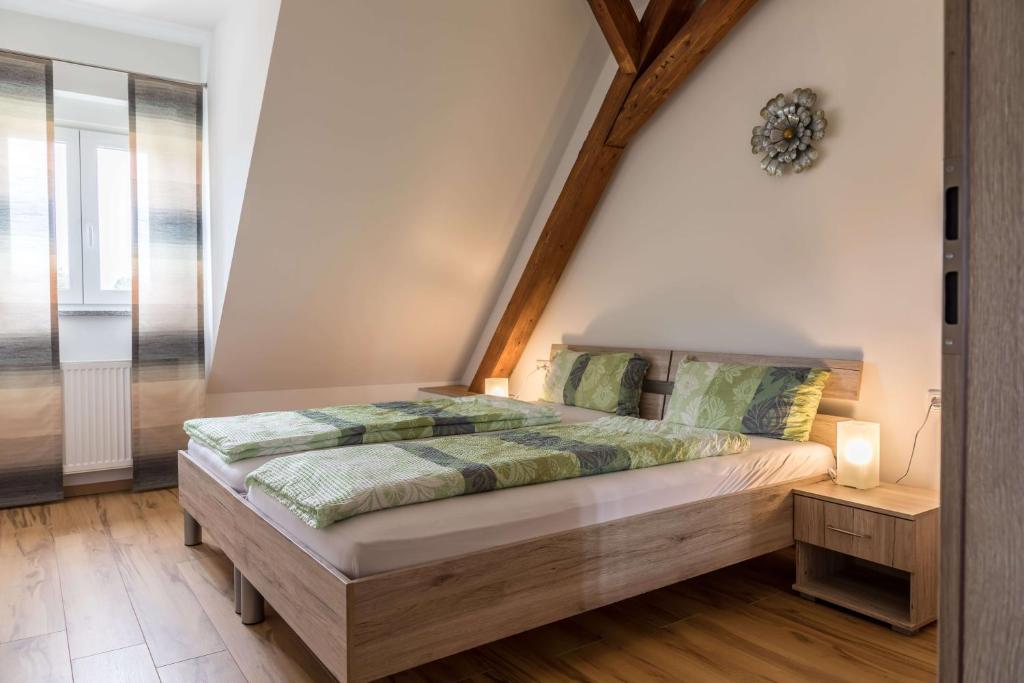 Postel nebo postele na pokoji v ubytování Ferienwohnung Zetzl