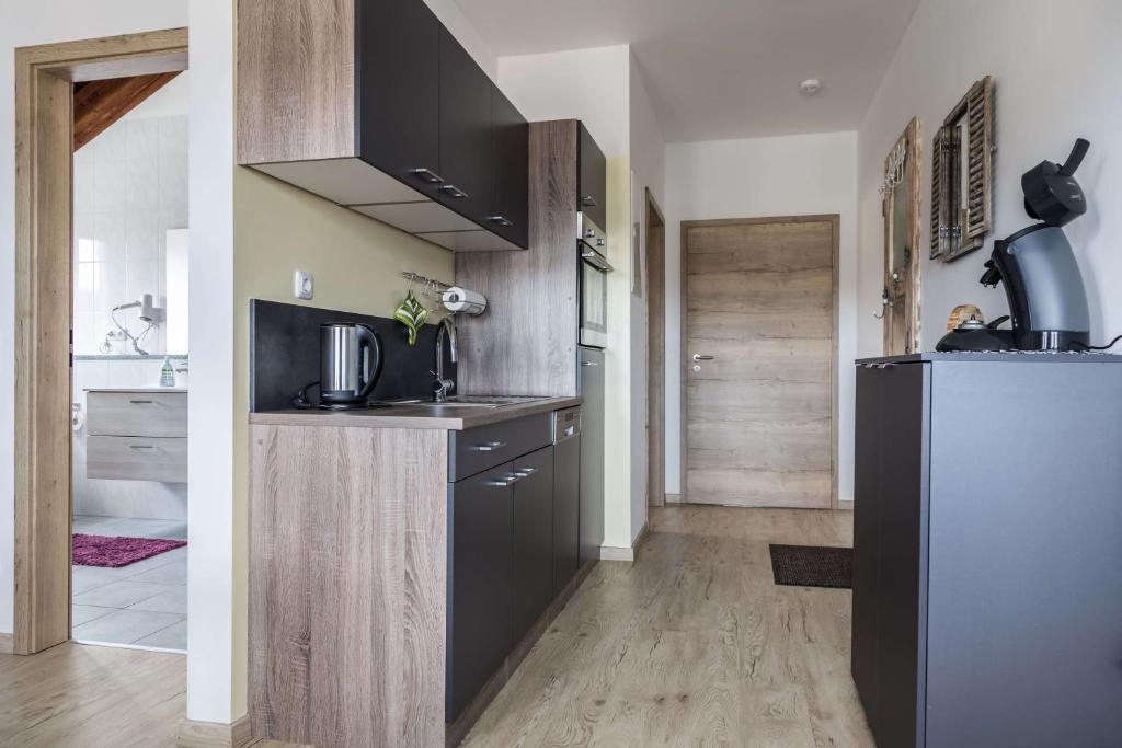 Kuchyň nebo kuchyňský kout v ubytování Ferienwohnung Zetzl