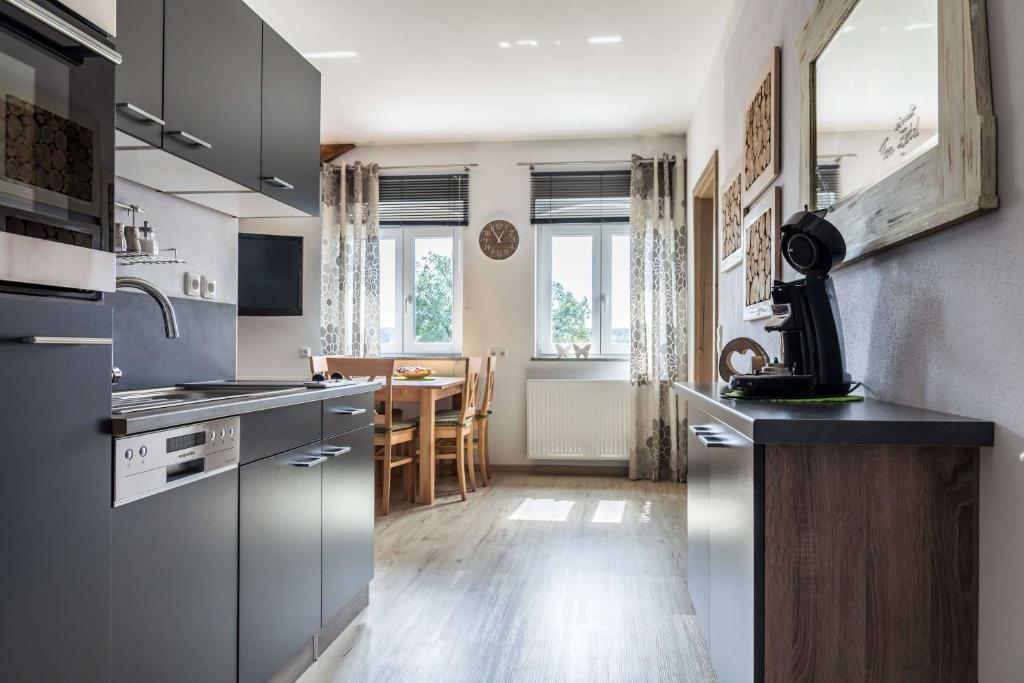 Kuchyň nebo kuchyňský kout v ubytování Ferienwohnung Zetzl