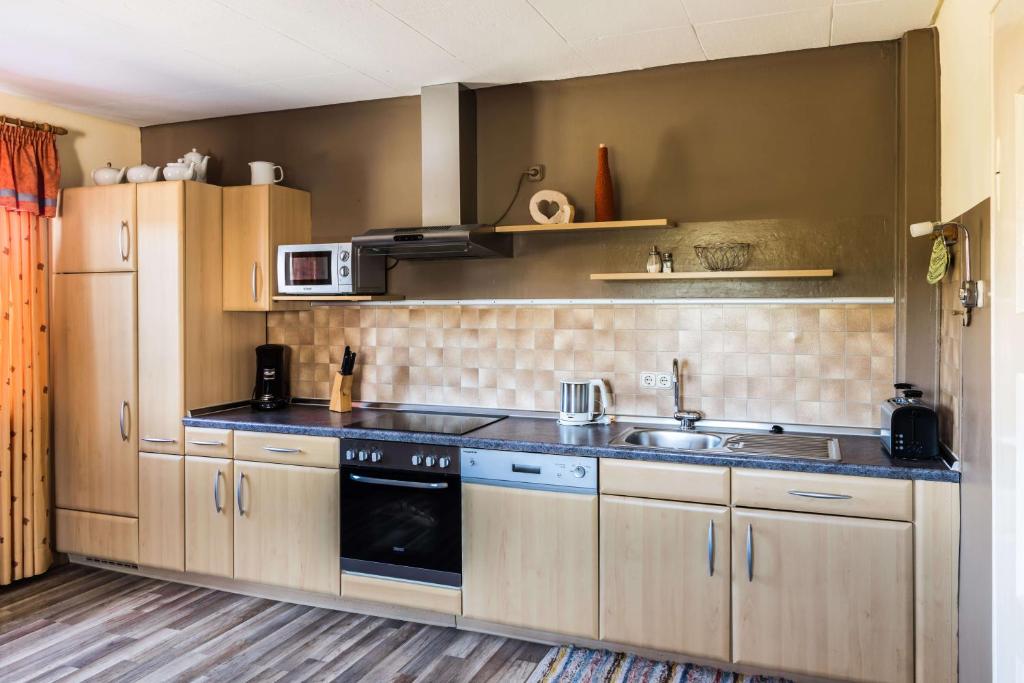 Kuchyň nebo kuchyňský kout v ubytování Ferienwohnung Zetzl