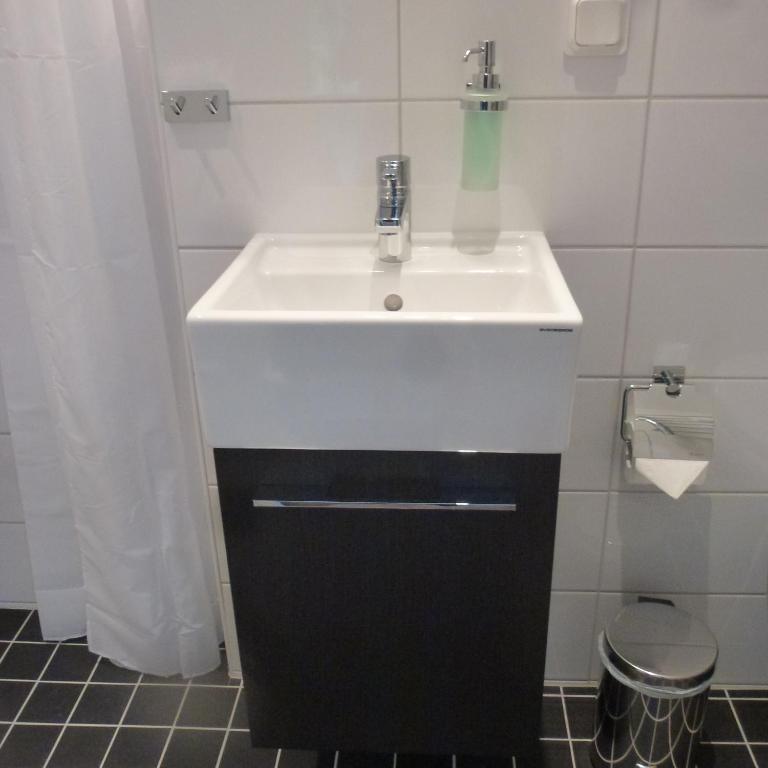 Koupelna v ubytování Hotell Slottsbacken