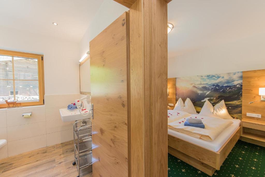 Postel nebo postele na pokoji v ubytování Apartments Unterfischergut