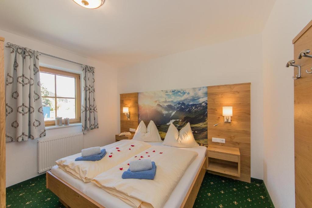 Postel nebo postele na pokoji v ubytování Apartments Unterfischergut