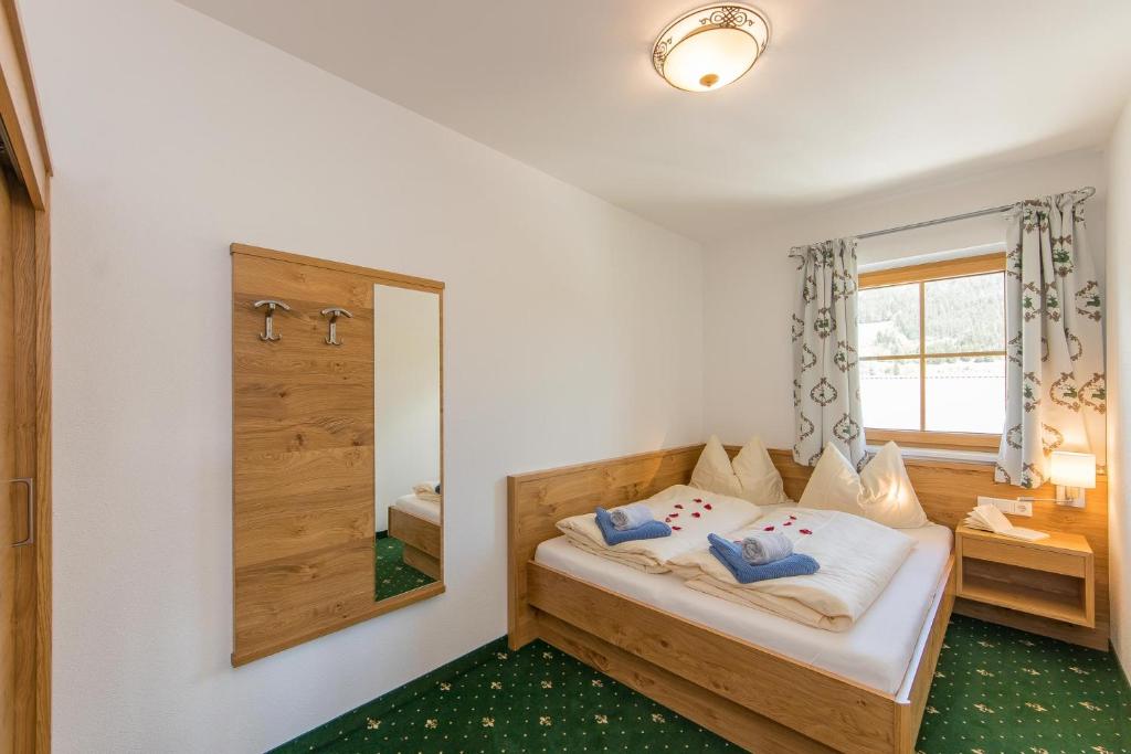Postel nebo postele na pokoji v ubytování Apartments Unterfischergut