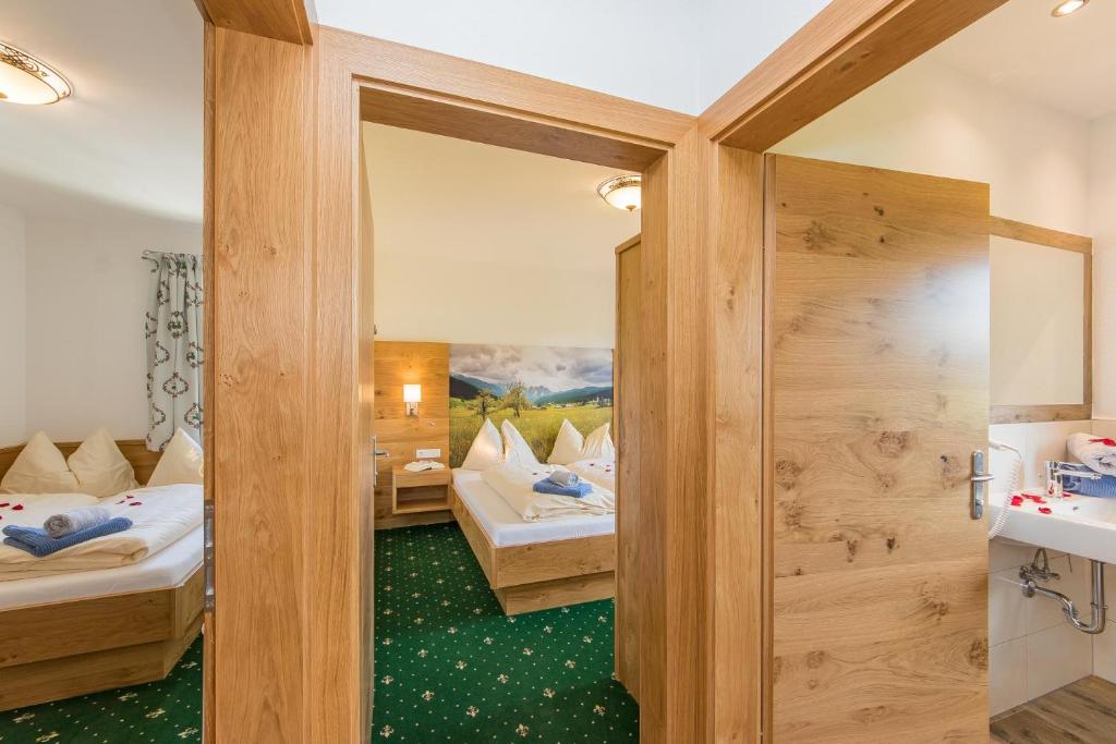 Postel nebo postele na pokoji v ubytování Apartments Unterfischergut