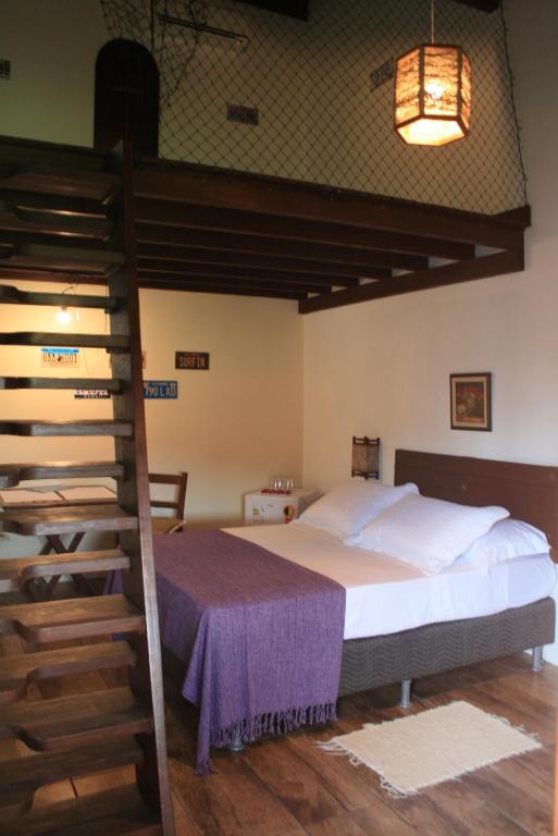Cama ou camas em um quarto em Santa Monica Hospedaria