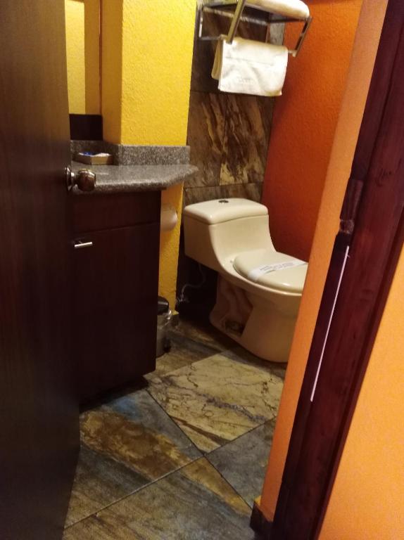 Koupelna v ubytování Hotel Rodelu