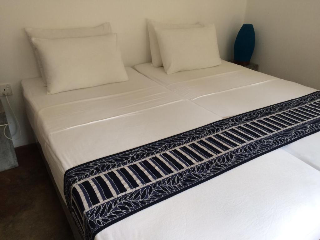 Postel nebo postele na pokoji v ubytování Selyna Sky Terrace