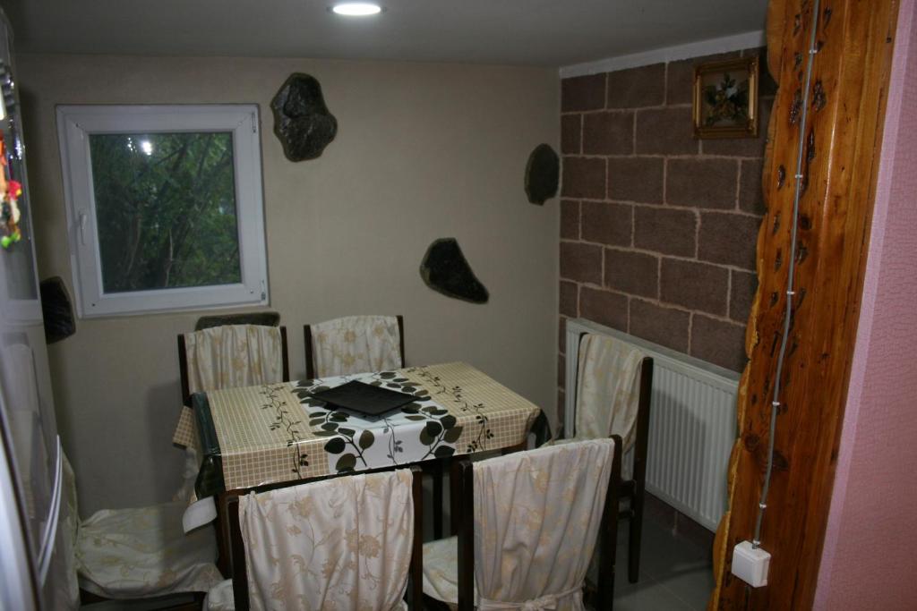 Posezení v ubytování Guest House Nima
